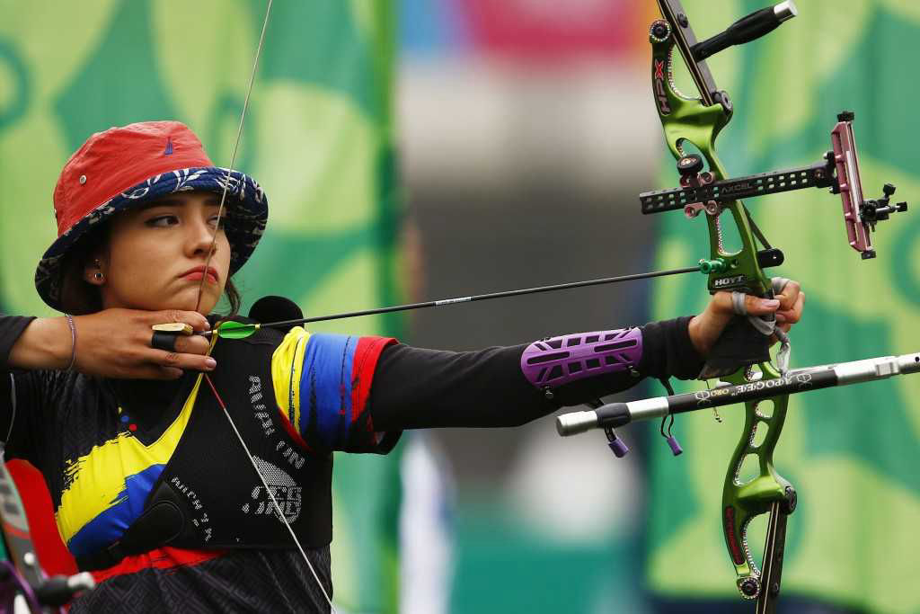 Elite archer Valentina Acosta utilizing focused sports performance hypnotherapy techniques